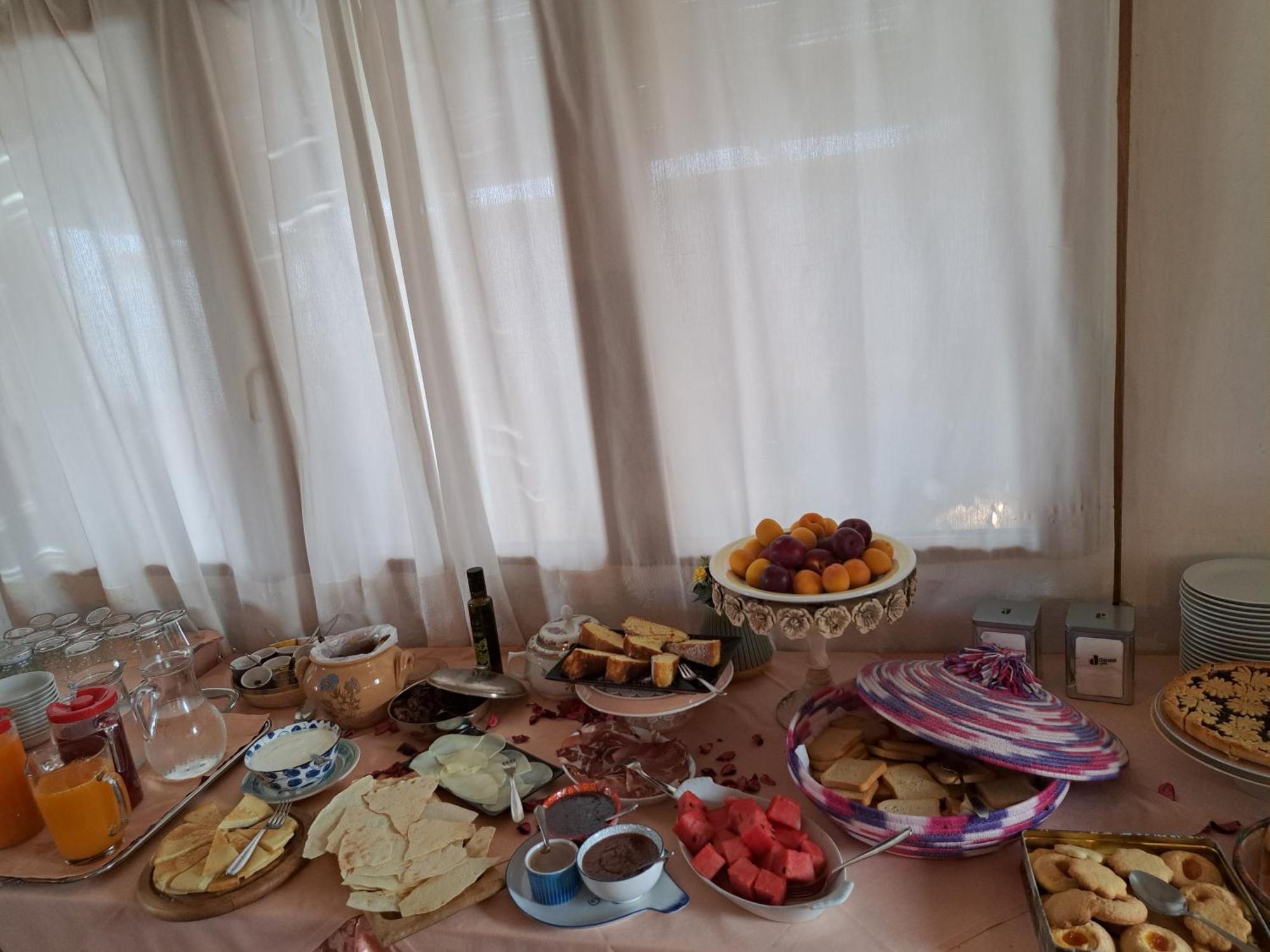 Locanda Tipica Sa Corte Олиена Стая снимка